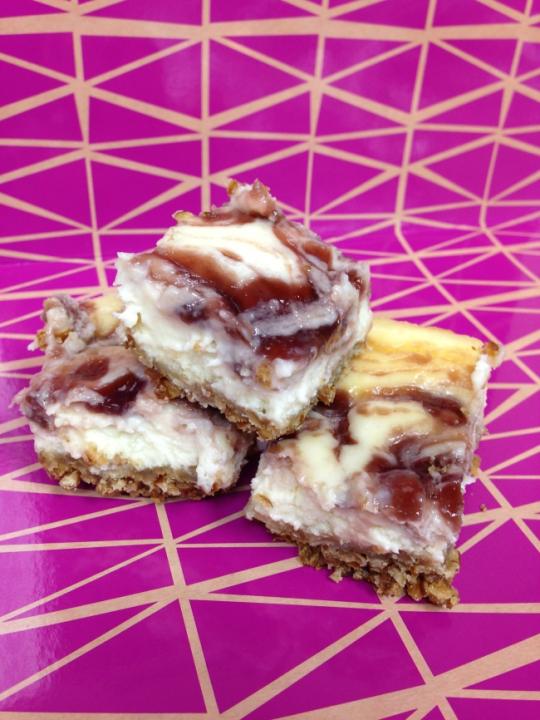 raspberry-lemon cheesecake squares with pretzel crust