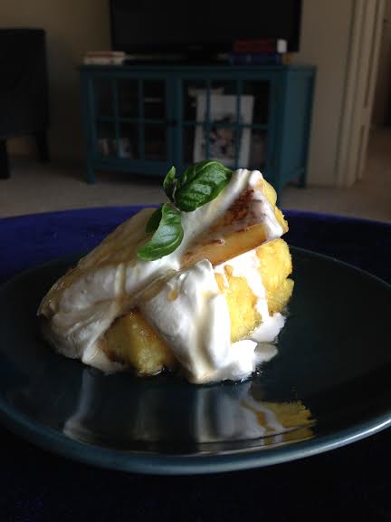 cinnamon-cayenne caramelized pineapple with whipped cream and rum-maple syrup