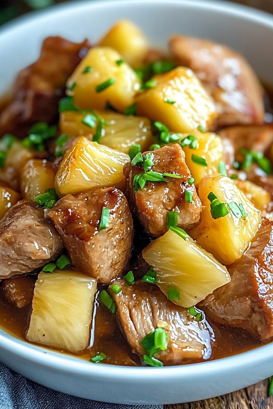 Bite-sized Slow Cooker Pineapple Pork portions on a plate