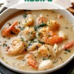Ladle lifting crab shrimp bisque