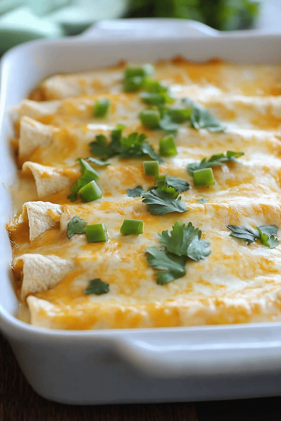Creamy chicken enchiladas baked with melted cheese