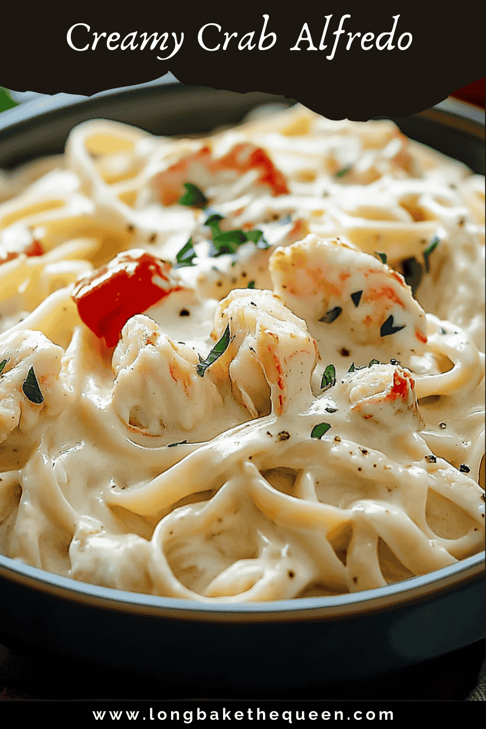 Fettuccine alfredo with crab on white plate