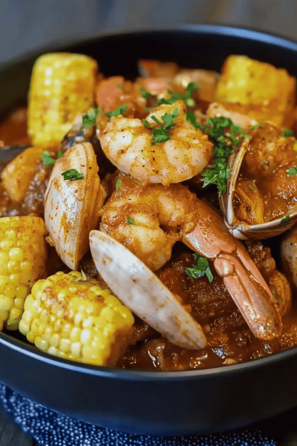Cajun shrimp, corn, and potatoes with spicy butter sauce