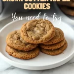 Stack of freshly baked brown butter maple cookies on a plate.