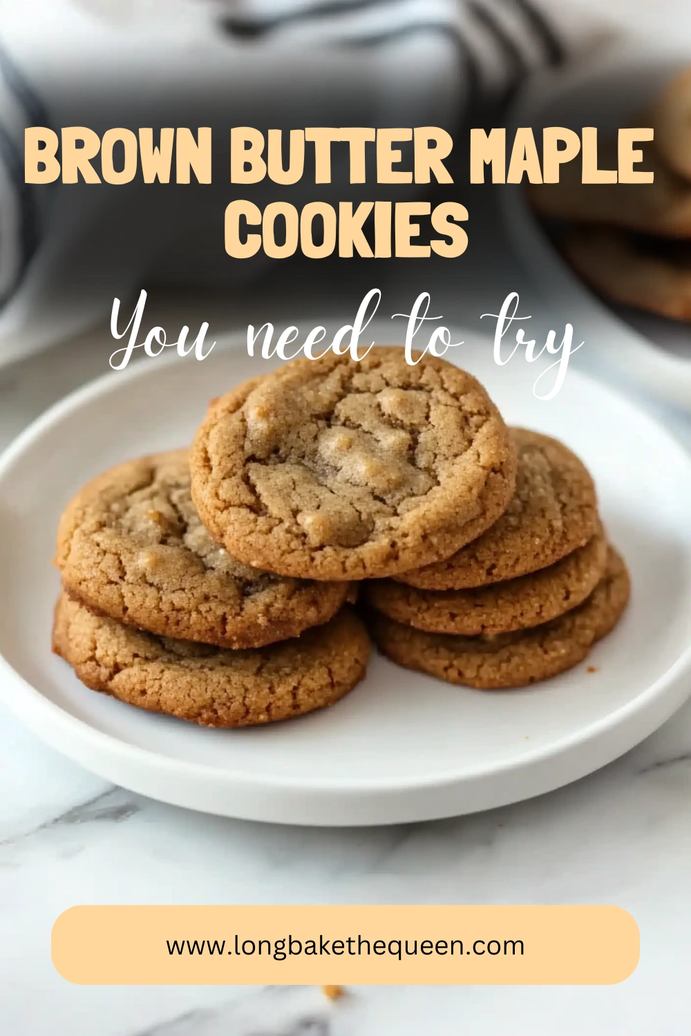 Stack of freshly baked brown butter maple cookies on a plate.
