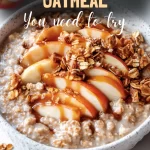 Warm bowl of caramel apple oatmeal with apple slices and caramel drizzle.