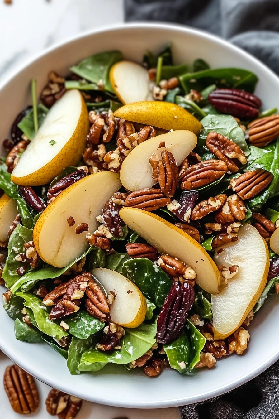 harvest salad pears pecans arranged neatly.