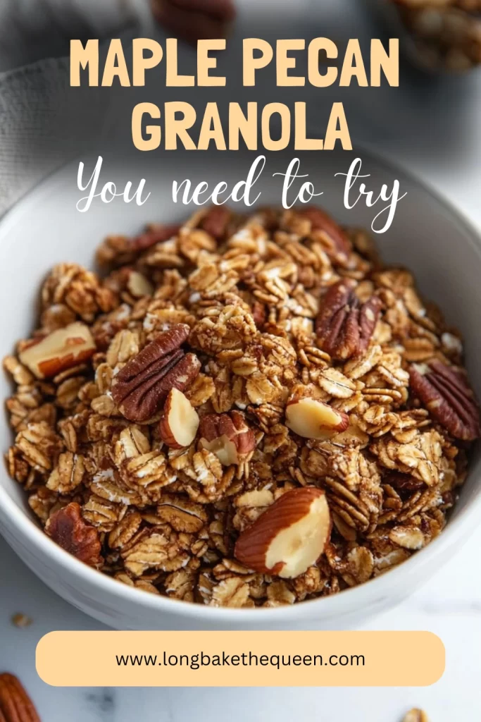 Golden-brown bowl of maple pecan granola with almonds and oats.