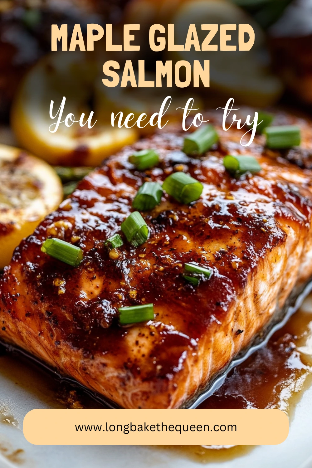 Perfectly baked maple glazed salmon fillet on a white plate.