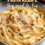 Overhead view of creamy pumpkin alfredo pasta served in bowl