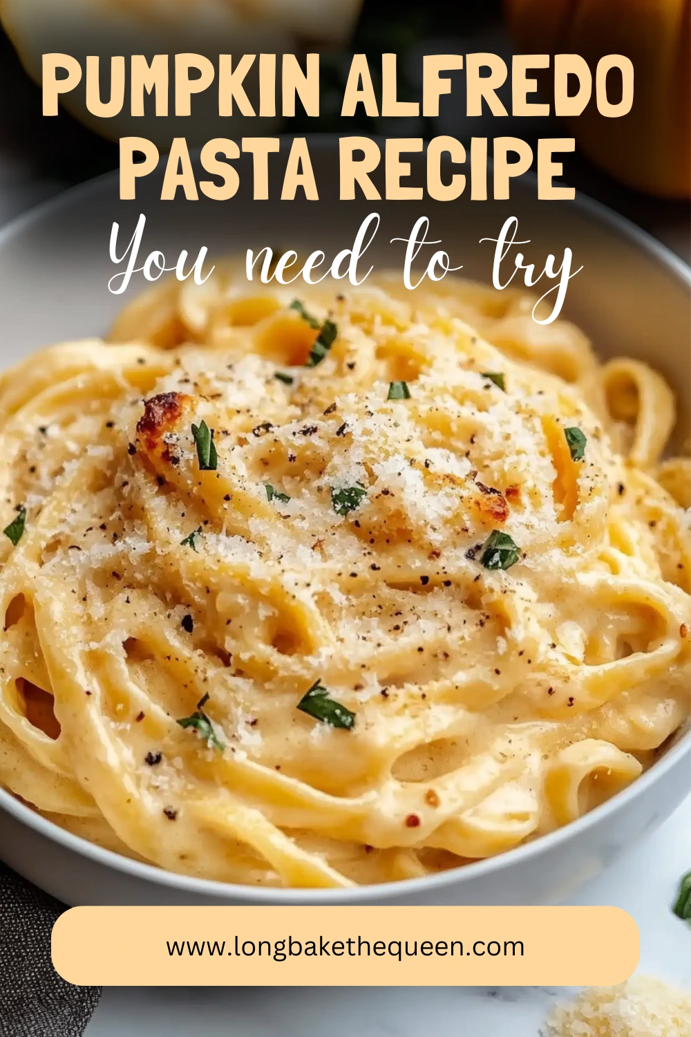 Overhead view of creamy pumpkin alfredo pasta served in bowl