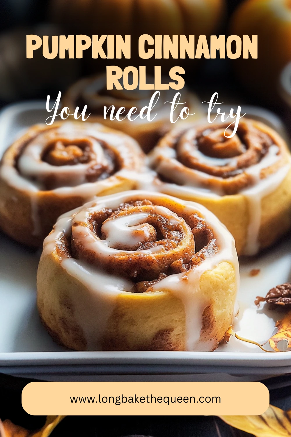 Freshly baked pumpkin cinnamon rolls with glaze on top