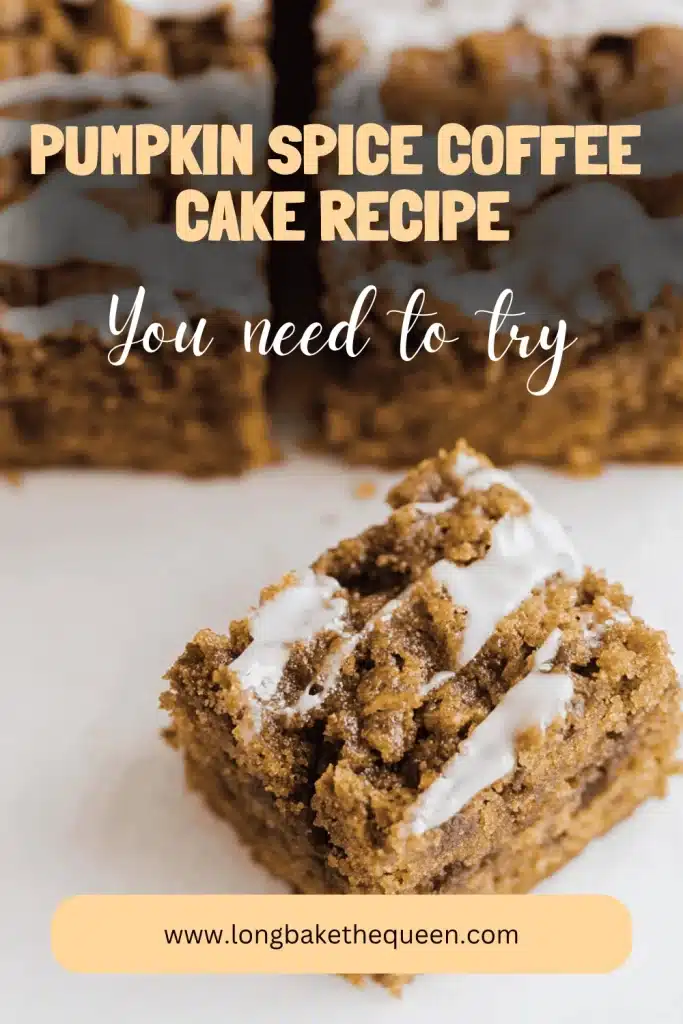 Freshly sliced pumpkin spice coffee cake on white plate
