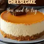 Creamy slice of pumpkin cheesecake on white plate.