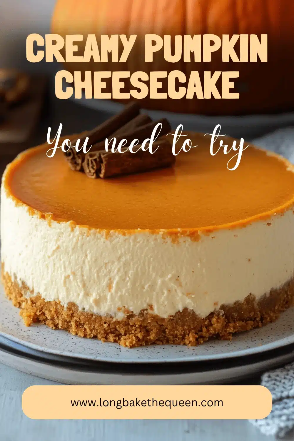 Creamy slice of pumpkin cheesecake on white plate.