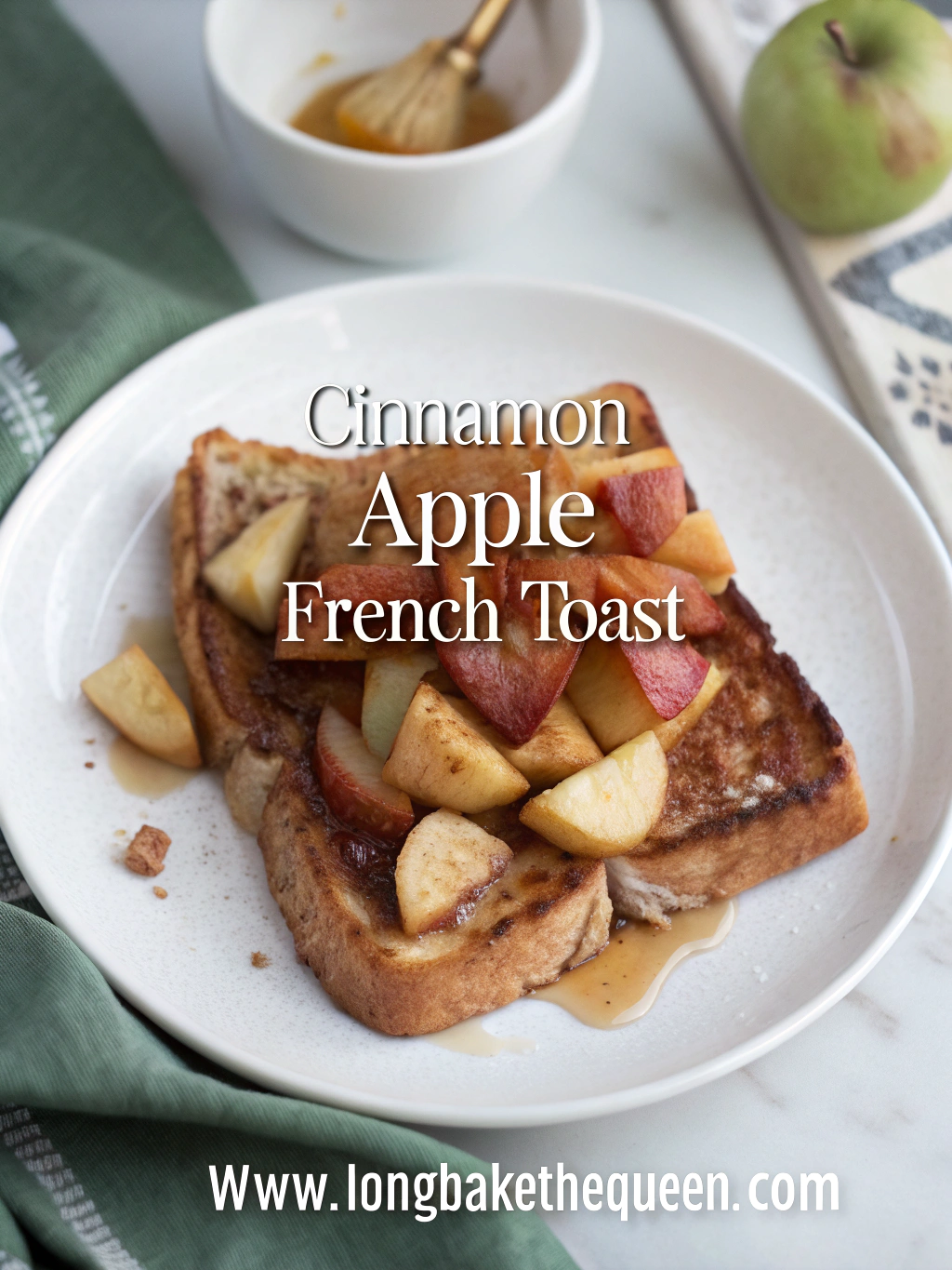 Golden cinnamon apple french toast served with sliced apples.