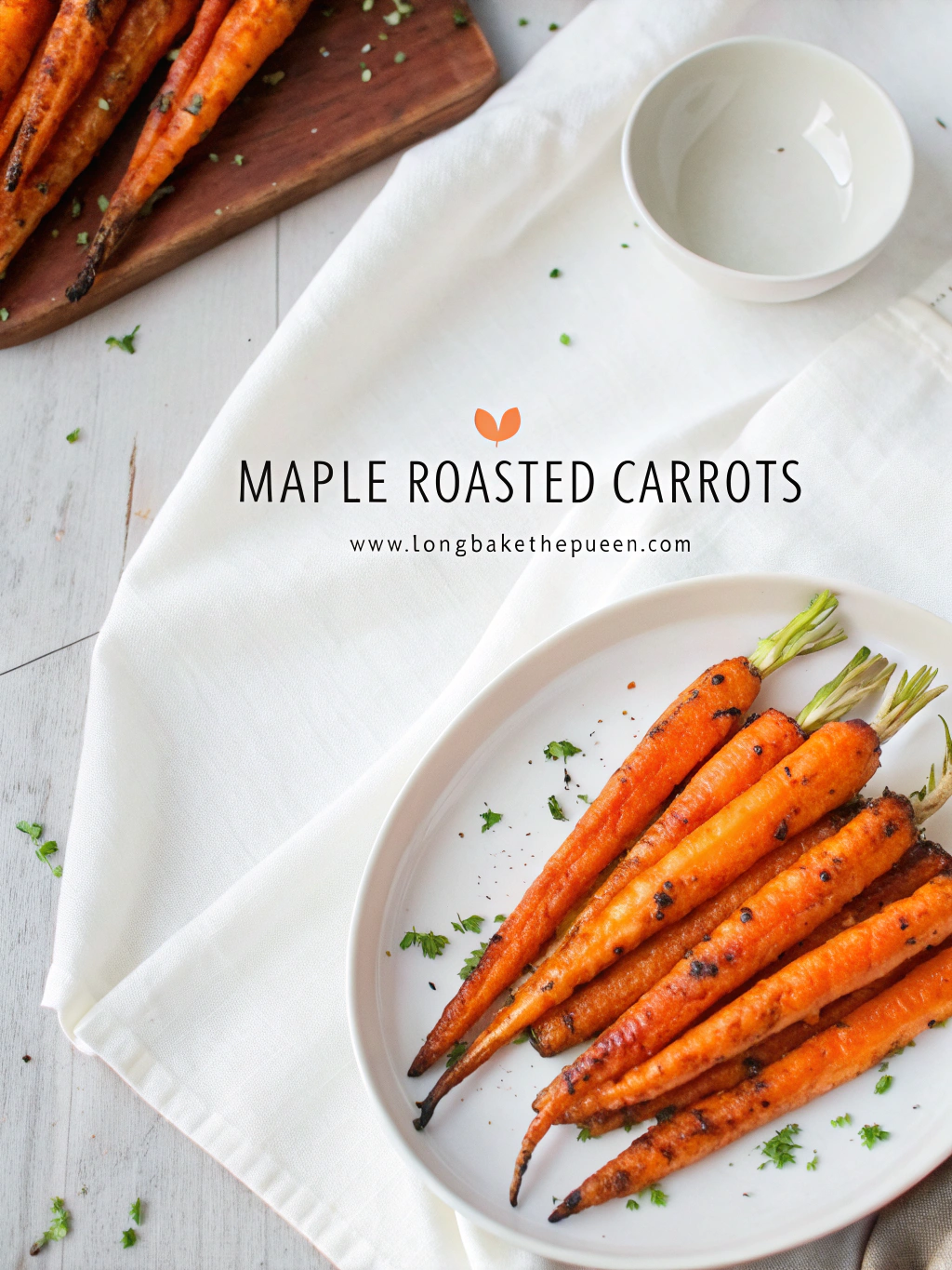 Golden maple roasted carrots glistening with caramel glaze on tray