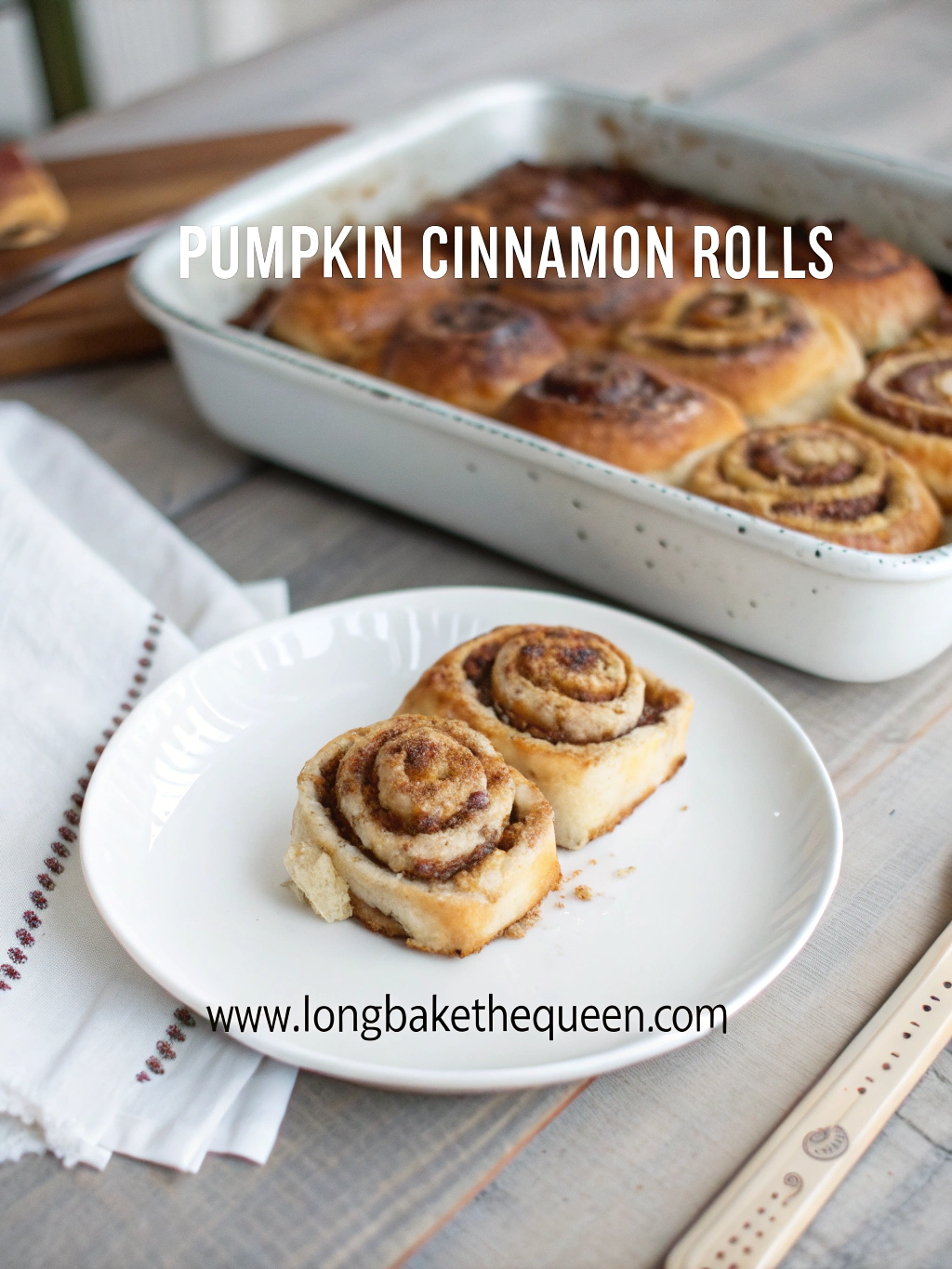 Freshly baked pumpkin cinnamon rolls with glaze on top