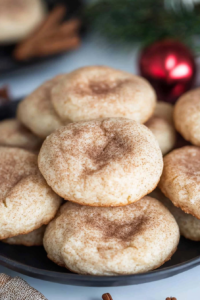 Freshly baked cookies arranged on a white plate, highlighting their fluffy texture.