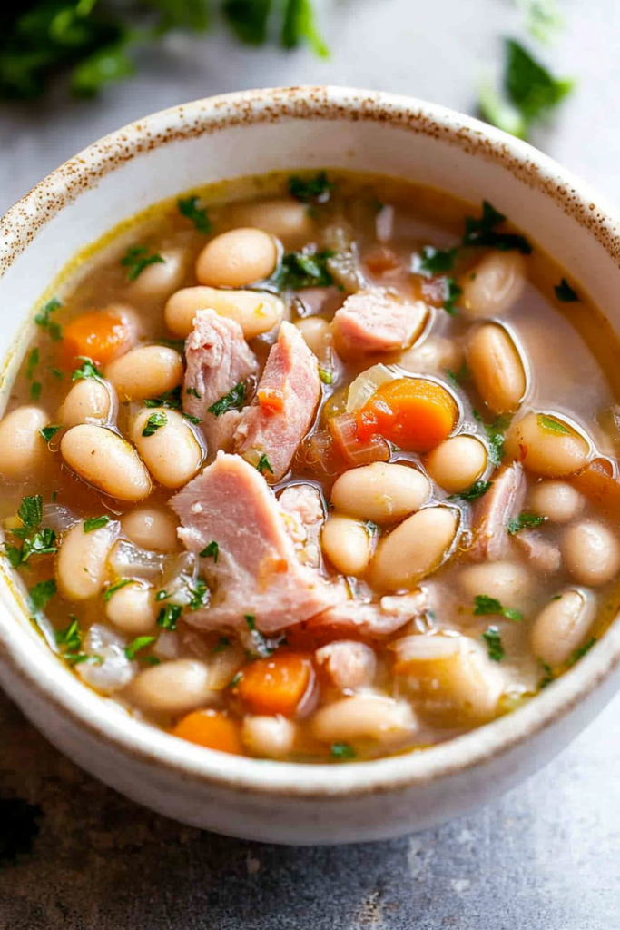 Hearty homemade soup served in a deep bowl, highlighting the colorful vegetables.