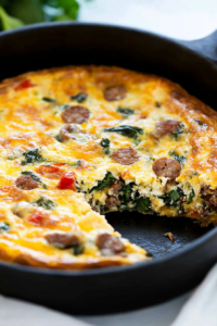 Rustic oven-baked egg dish with a golden surface and soft center, served straight from the skillet.