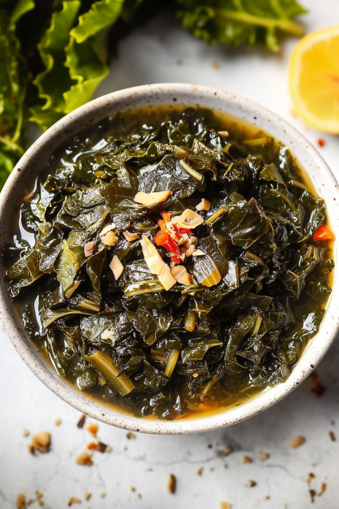 Classic Southern collard greens, served warm with colorful peppers and onions.