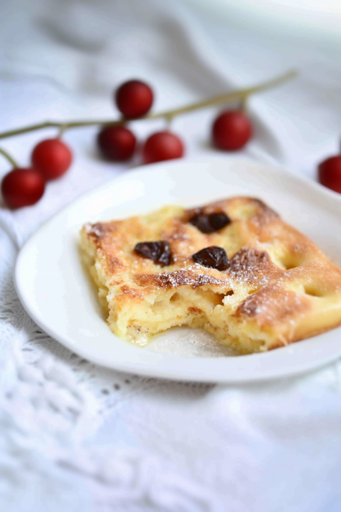 Classic dessert featuring golden layers of bread, melted sugar, and a touch of spice.