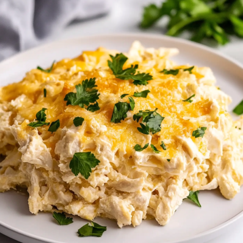 Rich and creamy chicken casserole with a bubbly cheese topping, ready to serve.