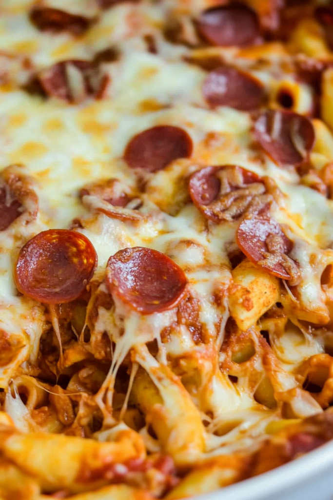 Quick Pizza Casserole fresh from the oven, with browned cheese and vibrant tomato sauce peeking through.