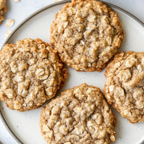 Plate of freshly baked oatmeal cookies with a soft, chewy texture