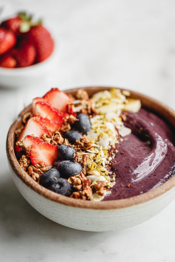 Creamy fruit blend topped with fresh strawberries, blueberries, and walnuts.