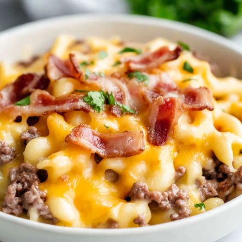 Creamy cheeseburger-style pasta loaded with melted cheddar and bacon pieces.