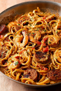 Skillet pasta loaded with smoky sausage, tender shrimp, and fresh herbs