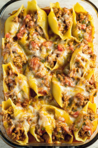 Hearty baked pasta dish with jumbo shells, meat sauce, and gooey cheese.