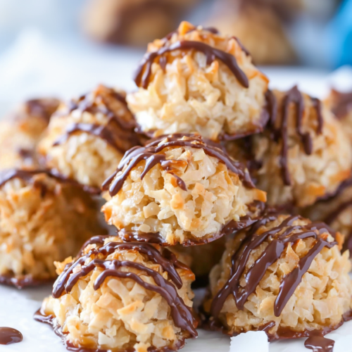 Homemade coconut macaroons with caramel and chocolate topping, ready to serve.