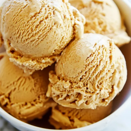 Close-up of spiced pumpkin dessert scoops with crunchy cookie swirls.