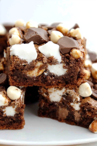 Chewy brownie squares finished with mini marshmallows, chocolate morsels, and nutty crunch.