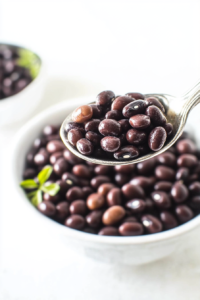 Instant Pot adzuki beans recipe plated in a clean white bowl, showing their deep red color.