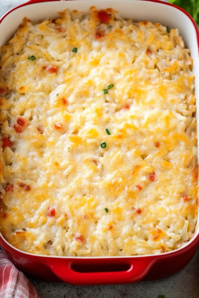 Close-up of hearty rice casserole, creamy texture highlighted against the pot.