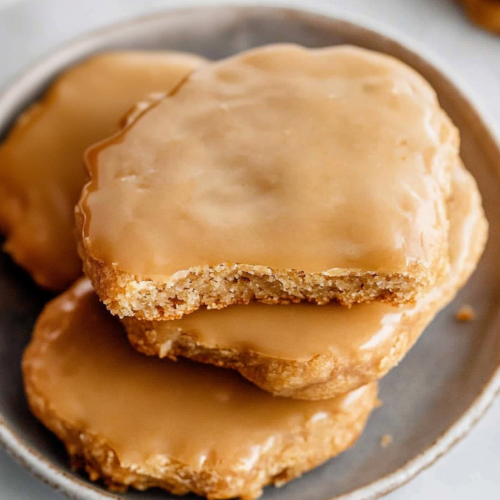 Final presentation of maple candy pieces, dense interior visible in one half.