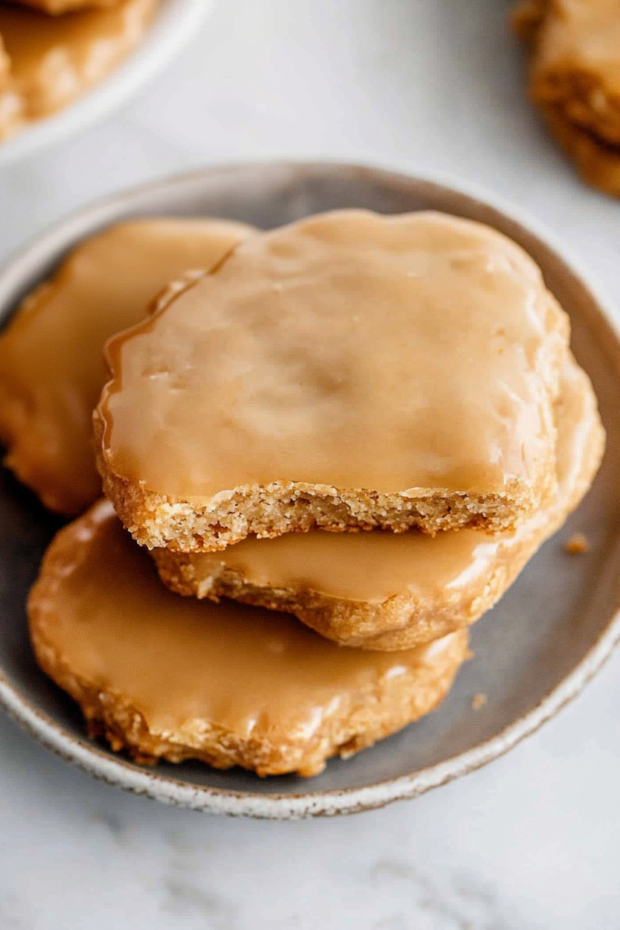 Final presentation of maple candy pieces, dense interior visible in one half.