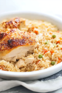 Hearty chicken and rice dish with perfectly browned chicken and fluffy grains.