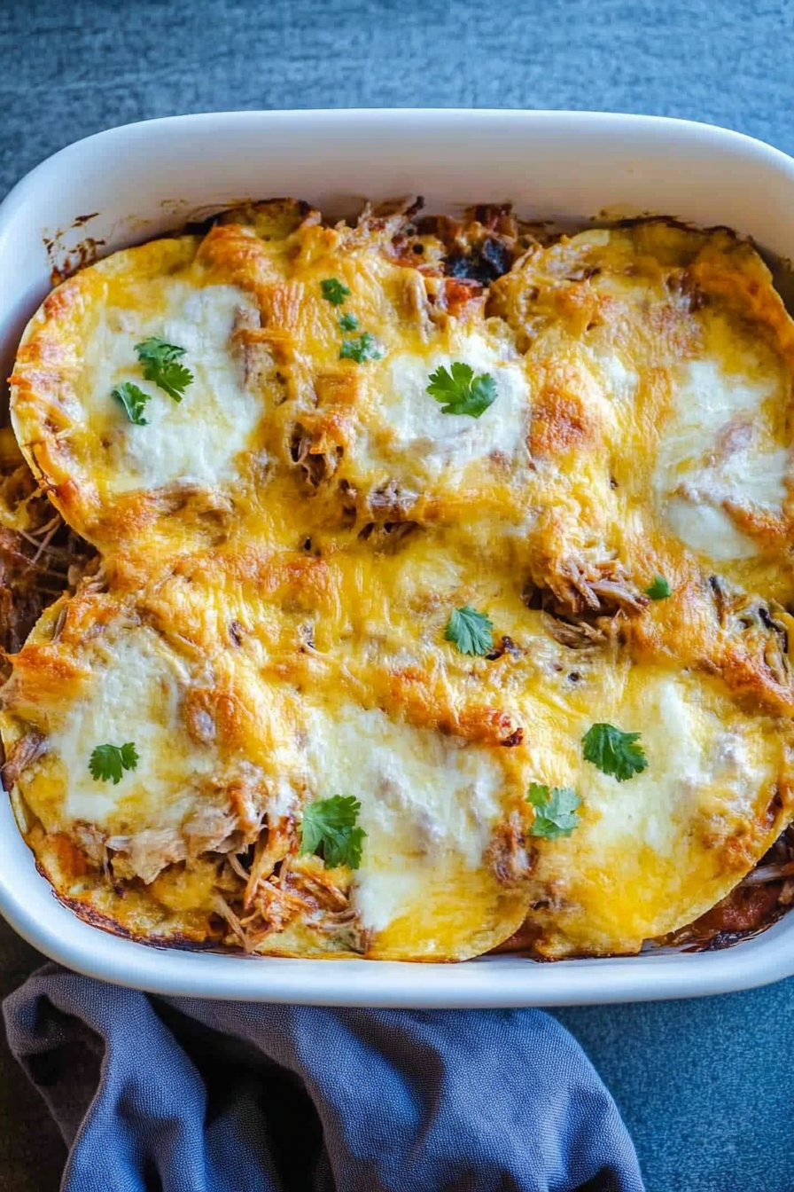 Cheesy baked casserole topped with fresh herbs and golden melted cheese