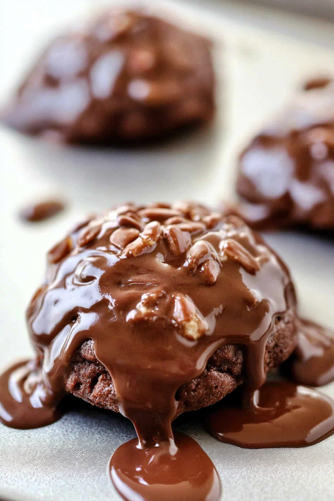 Decadent frosted cookies with a soft, brownie-like texture and chocolate glaze