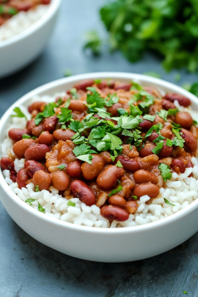 Homemade beans and rice dish garnished with fresh green herbs
