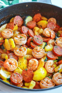 Overhead view of skillet meal highlighting vibrant colors and rustic presentation.