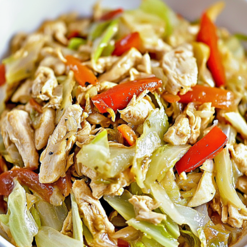 Juicy chicken strips tossed with soft cabbage and vibrant mixed vegetables
