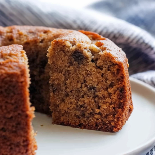 Homemade banana bread slices arranged neatly, emphasizing contrast between crust and tender crumb