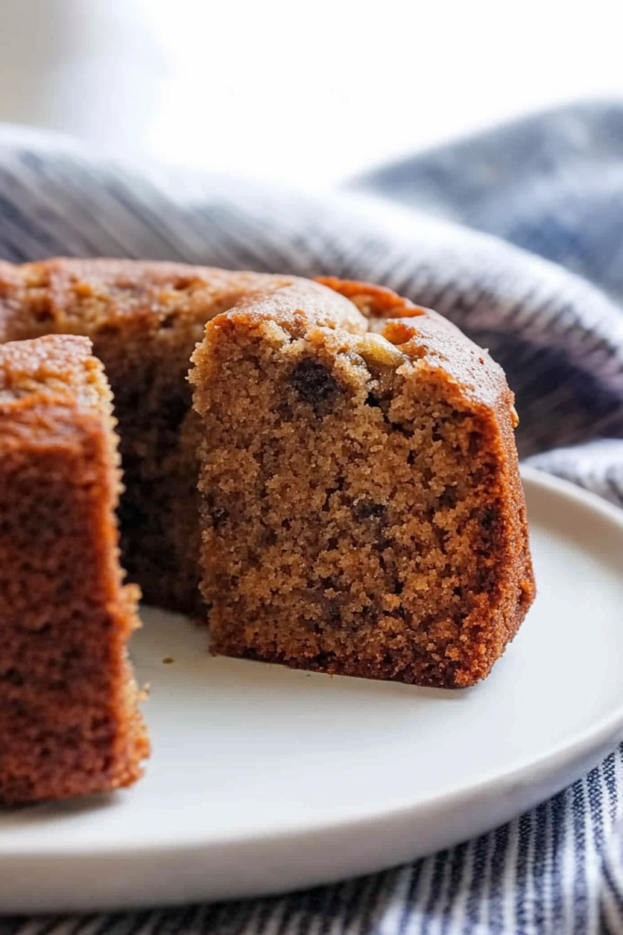 Homemade banana bread slices arranged neatly, emphasizing contrast between crust and tender crumb