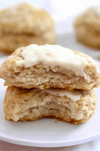 Soft, airy biscuit with visible spice flecks and a delicate glaze finish.